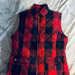 Black and red flannel, quilted vest. Never worn with the tags. Size small